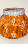 Decorative jar with floral design and patterned lid on a white background