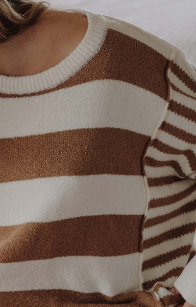 Close-up of a brown and beige striped sweater