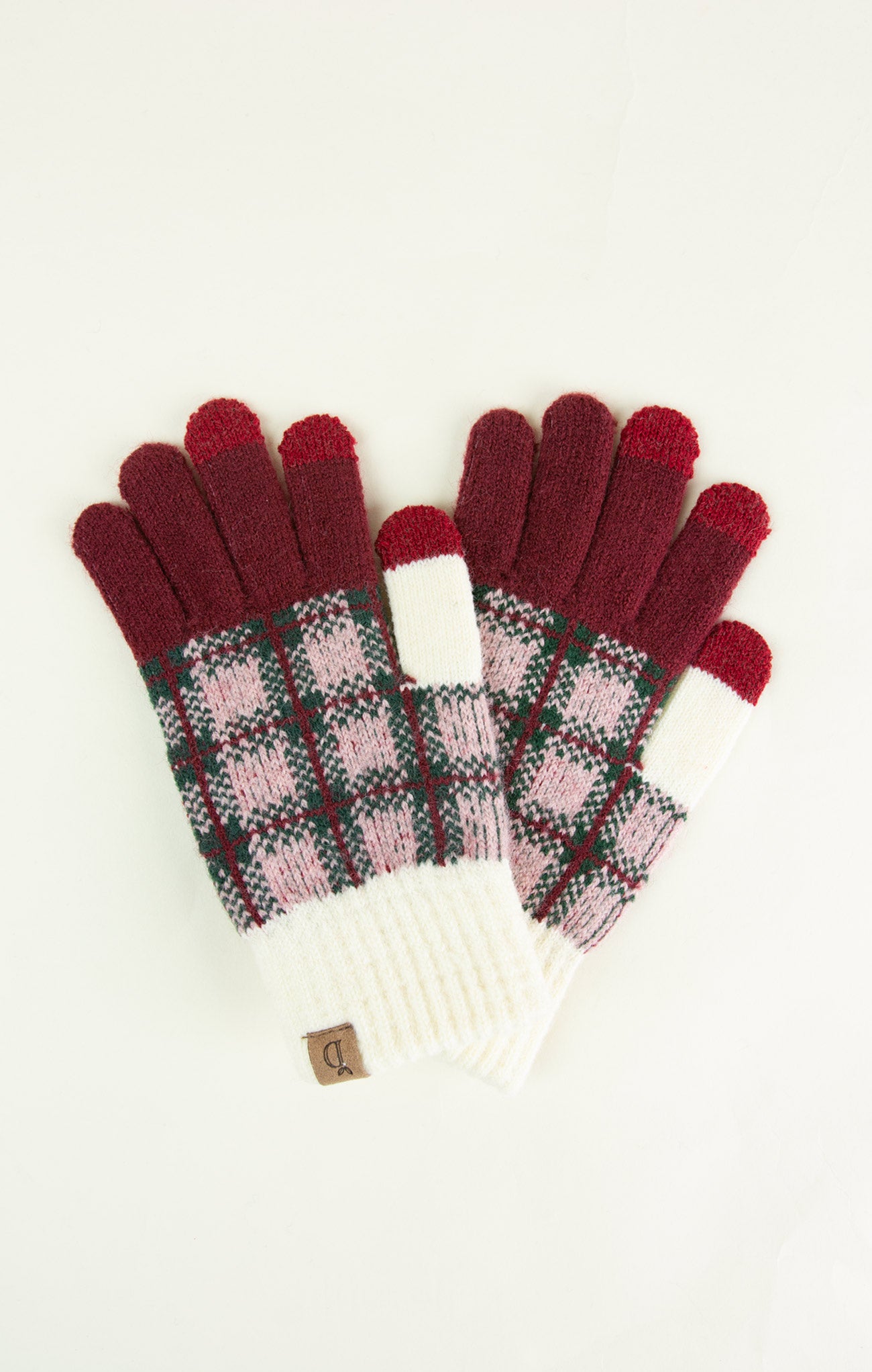 Pair of gloves with plaid pattern on a white background