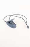 Blue leather strap with a metal buckle on a white background