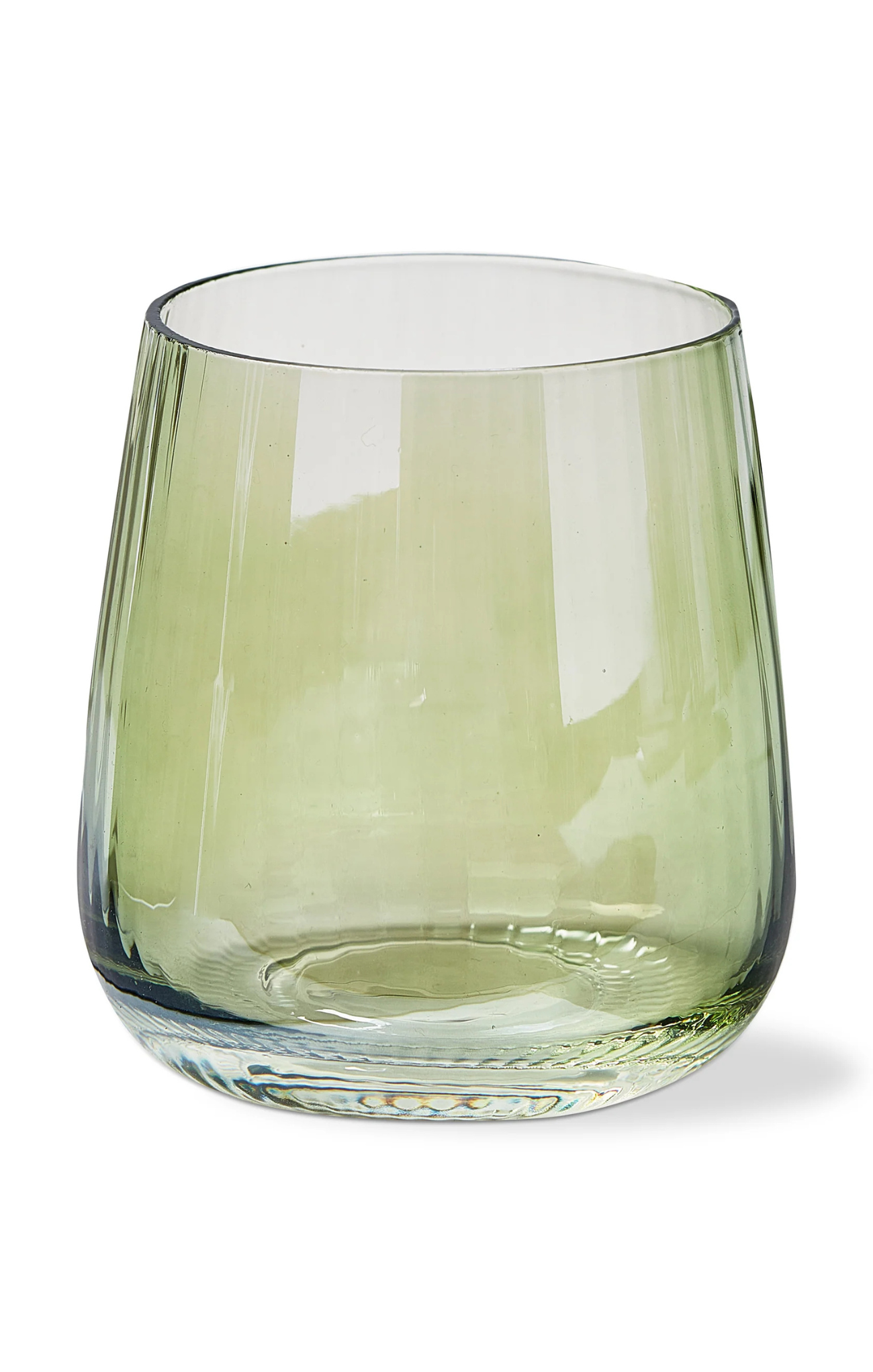 Green glass tumbler on a white background