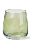 Green glass tumbler on a white background