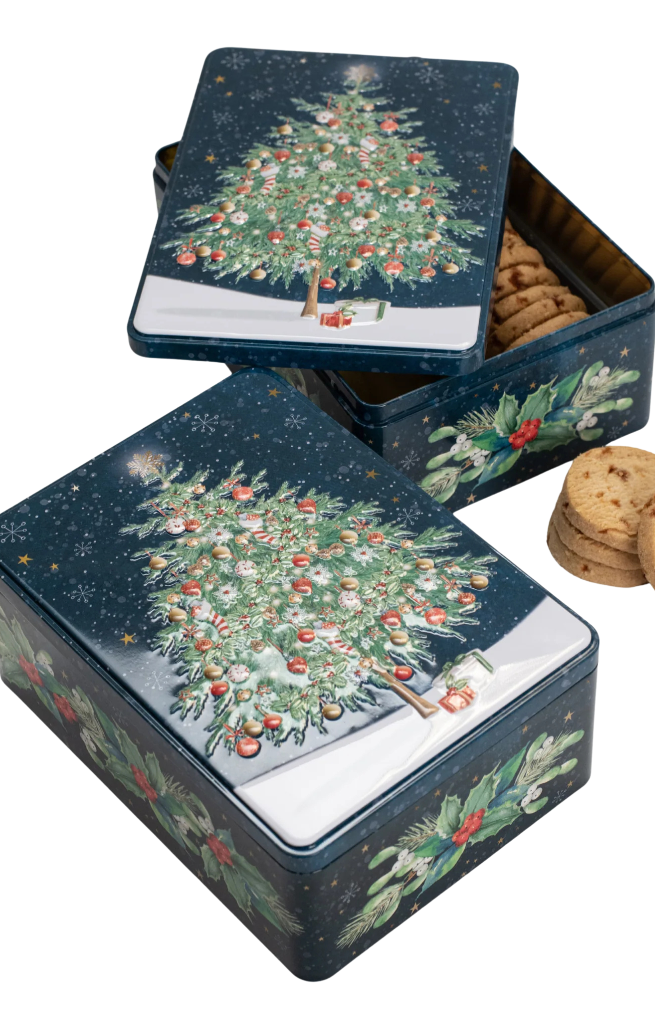 Decorative cookie tin with Christmas tree design on a white background