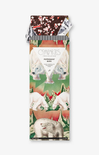 Packaged peppermint bark with polar bear illustrations on a white background