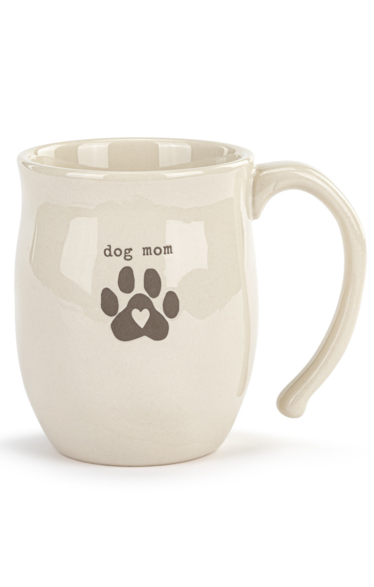 Beige mug with 'dog mom' and paw print design on a white background