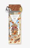 Chocolate bark with nuts and cranberries on a white background