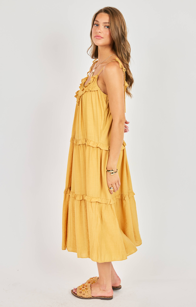 woman wearing yellow dress on white background