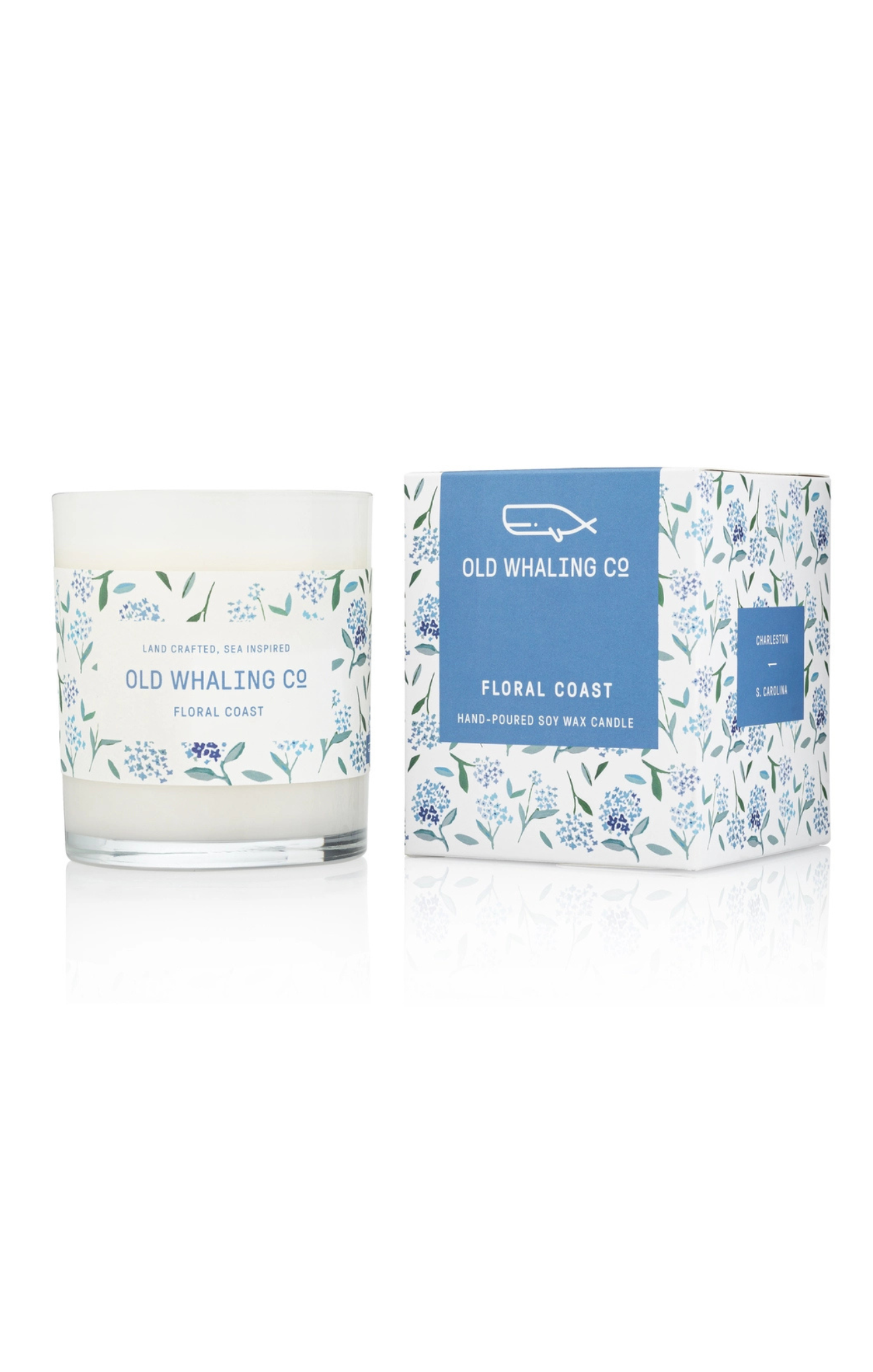 blue floral candle that says old whaling co on it on white background
