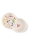 Decorative ceramic dish with floral and bird design on a white background