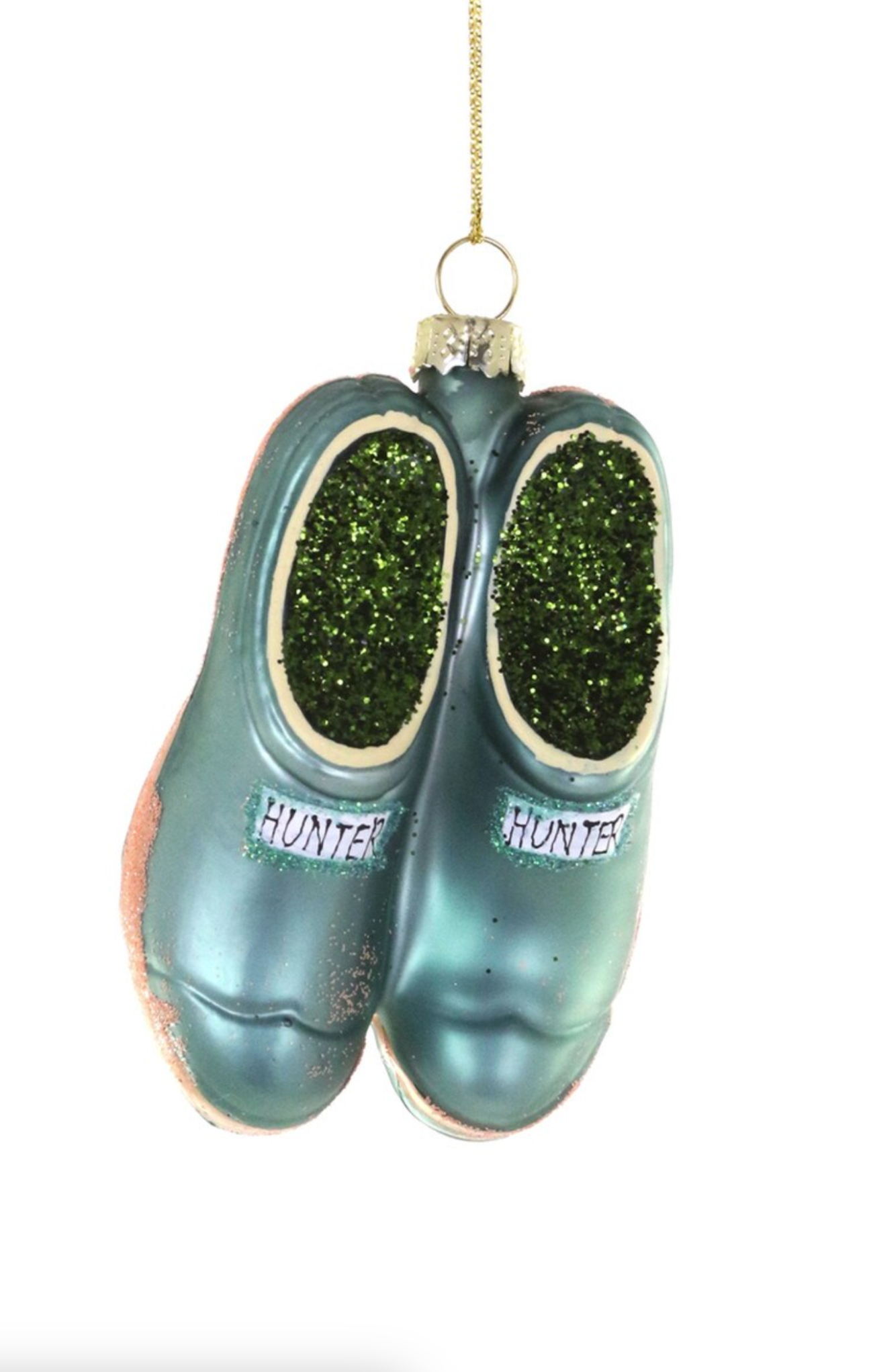 Glass ornament shaped like a pair of green Hunter boots on a white background