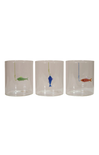 Three clear glass tumblers with fish illustrations on a white background