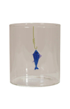 Clear glass candle holder with blue fish and gold hook design on a white background