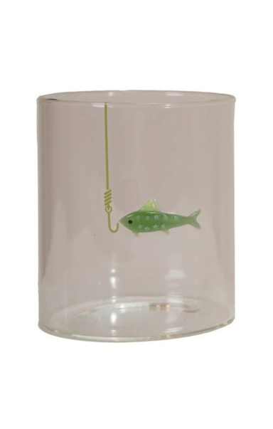 Clear glass tumbler with a fish and hook design on a white background