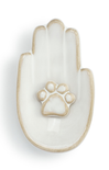 Decorative ceramic hand with a paw print on a white background