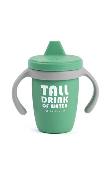 green sippy cup that says tall drink of water on the front with white background