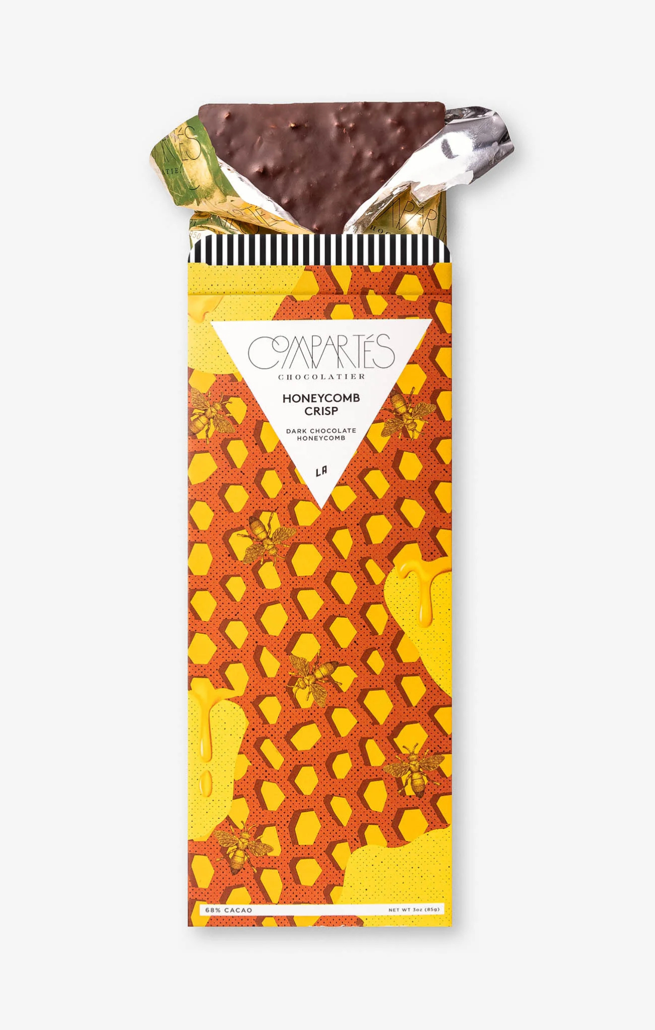 Chocolate bar with honeycomb crisp packaging on a white background