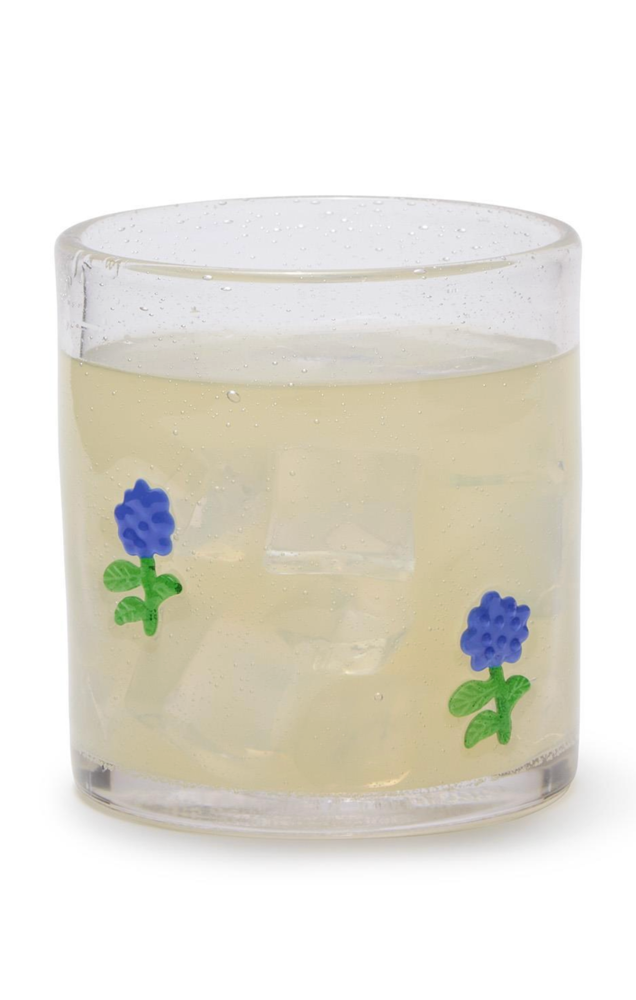 Clear glass candle with blue floral designs on a white background