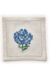 Embroidered blue flower on a white fabric square