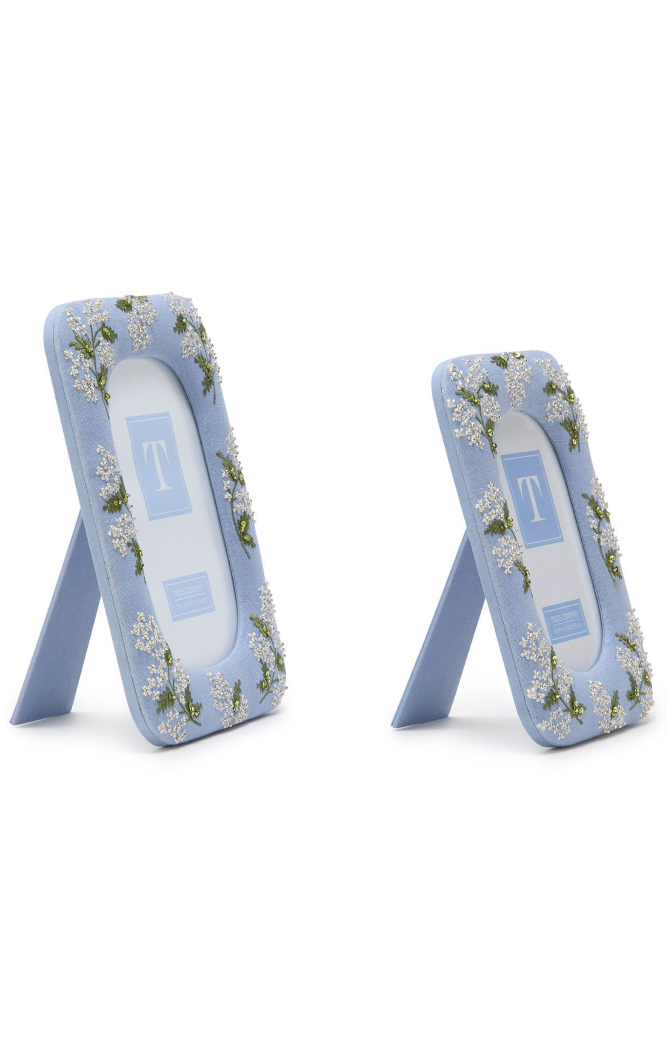 Two floral-patterned baby wipes containers on a white background