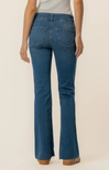 woman in jeans on white background