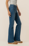 woman in jeans on white background