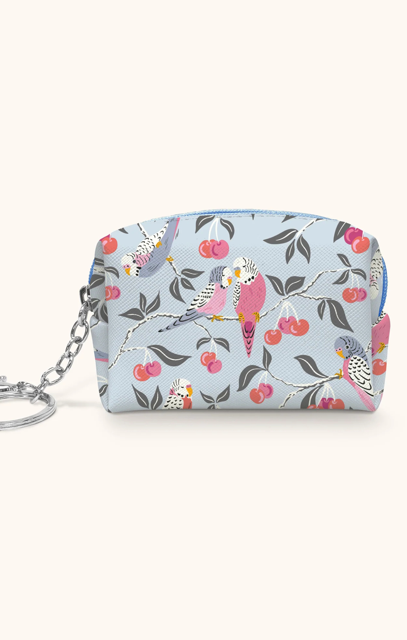 Small pouch with bird and cherry pattern on a light blue background