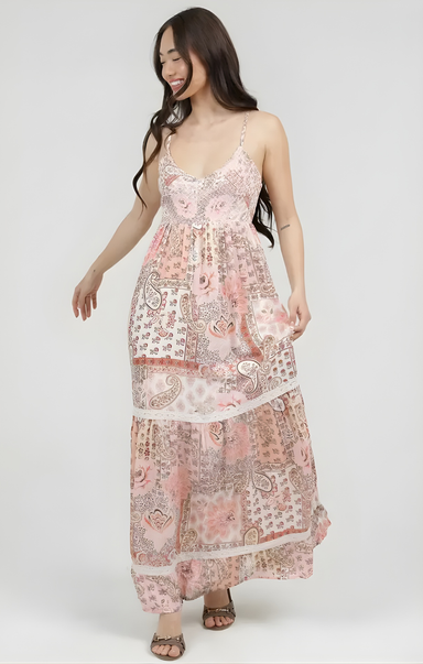 Woman wearing a floral dress on a white background