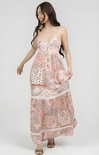 Woman wearing a floral dress on a white background