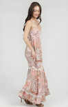 Woman wearing a floral dress on a white background