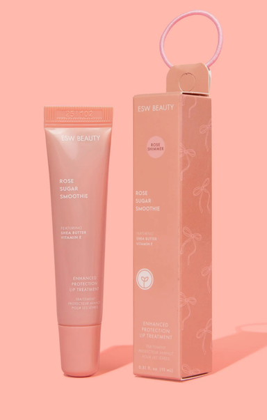 Rose Beauty product and packaging on a pink background