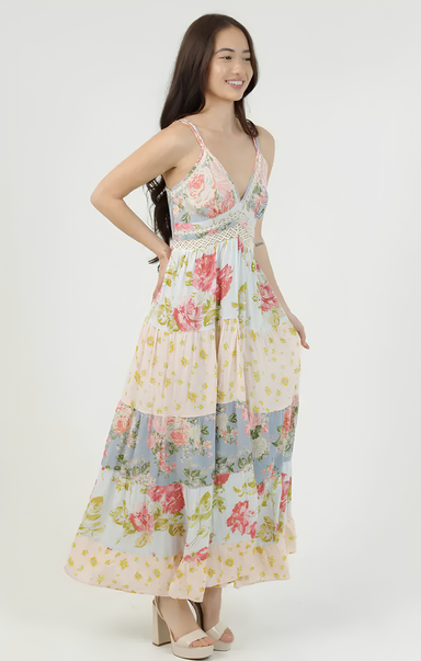 Woman wearing a floral dress on a white background