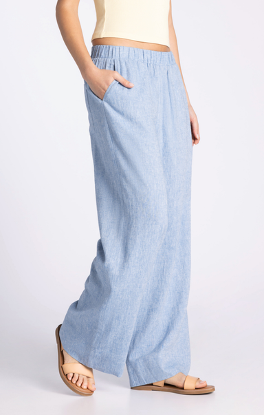 Light blue wide-leg pants worn by a person on a white background