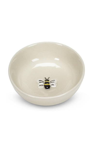 beige bowl with bee in center with white background