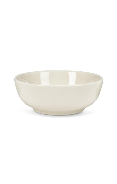 side of beige bowl on white background