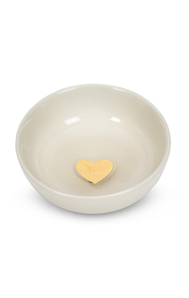 beige bowl with yellow heart in center on white background
