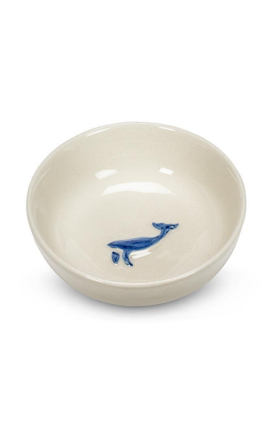 beige bowl with whale on inside on white background