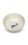 beige bowl with whale on inside on white background