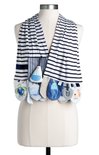Striped baby blanket with toy pouches on a mannequin against a white background