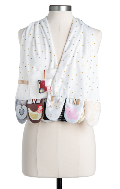 Mannequin wearing a white vest with printed pouches on a white background