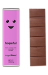 Moodibars chocolate bar with a pink packaging featuring a smiley face on a white background