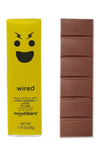 Moodibars milk chocolate bar with yellow packaging featuring a face design on a white background.