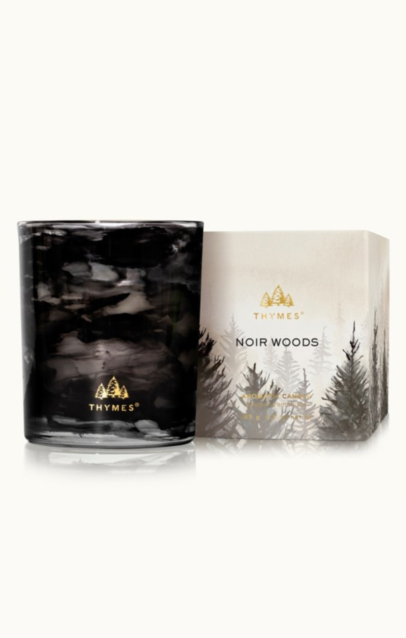 Thymes Noir Woods candle packaging on a white background