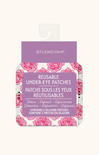 Pack of reusable under-eye patches with pink roses on a white background