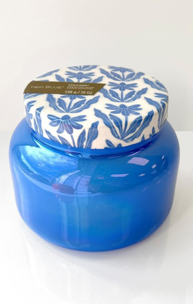 Blue jar with a patterned lid on a white background