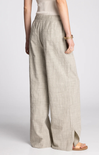 Beige wide-leg pants worn by a person on a white background