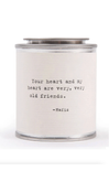 Candle with a quote by Hafiz on a white background