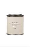 Candle with Rumi quote on a white background