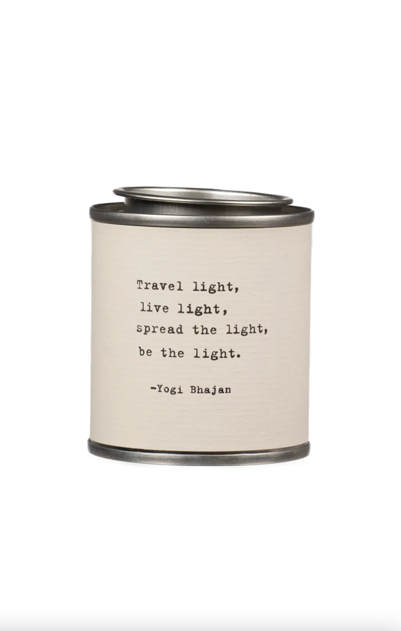 Candle with a quote by Yogi Bhajan on a white background