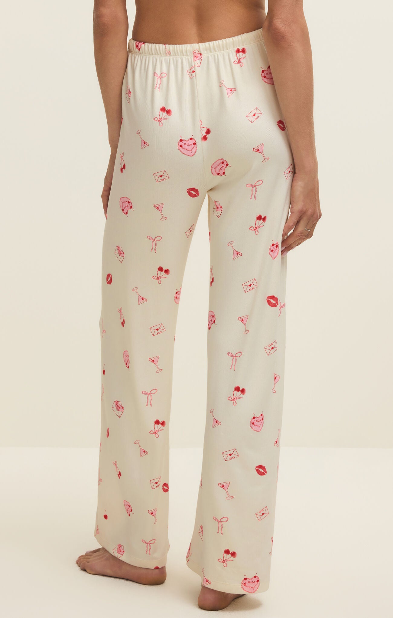 Floral patterned pajama pants on a plain background