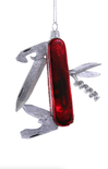 Multitool with red blade and silver tools on a white background